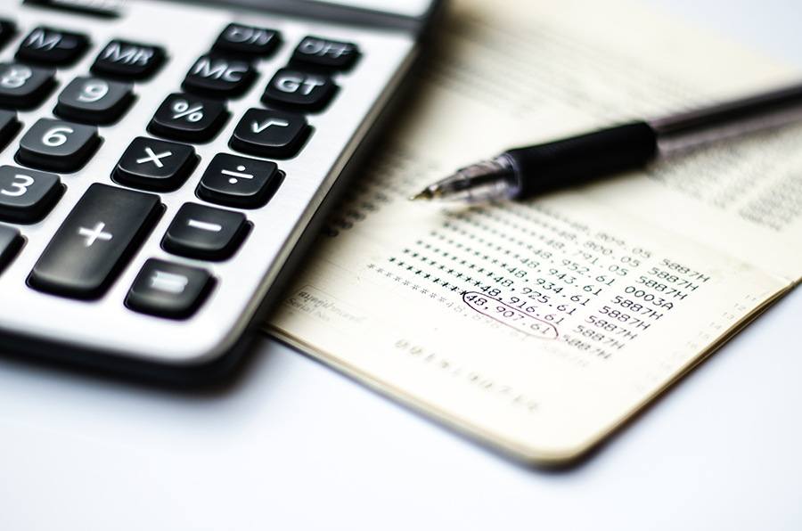 Calculations,And,Account,Book,And,Pen a calculator, pen and paper